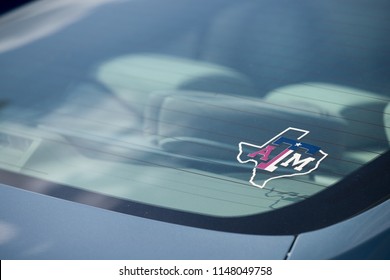 Texas, USA, September 16 2017: Logo ATM of Texas AM University in a shape of Texas state on the rear window of a car.