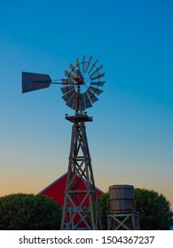 Texas Windmill And Barn At Sunset