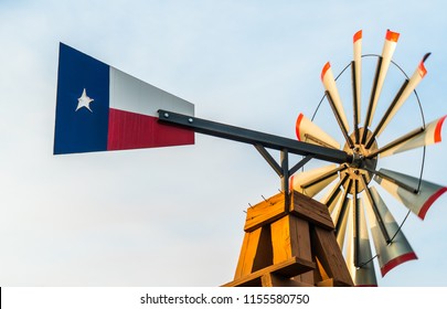 Texas Windmill At Sunset With A Texas Flag Shaped Tail