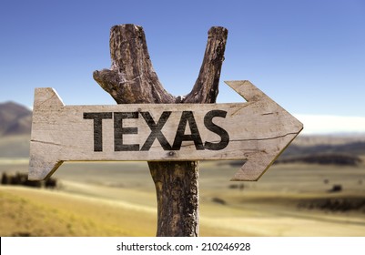 Panneau de bois texan isolé sur fond désert