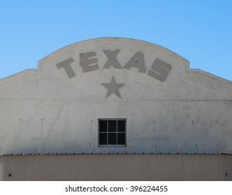 Texas writing and star on building