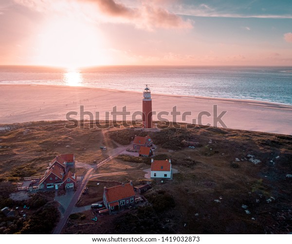 Texel lighthouse during sunset Netherlands Dutch\
Island Texel