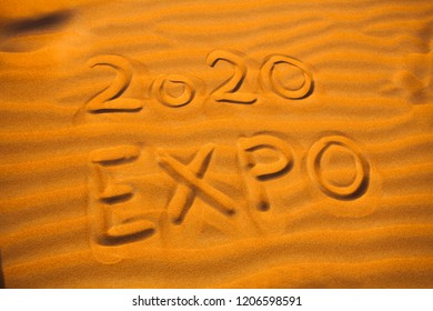 text 2020 expo for Dubai concept written in desert sand