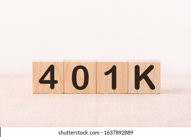 The text 401K is written in cubes on a light background. Retirement investment. invest in your 401K