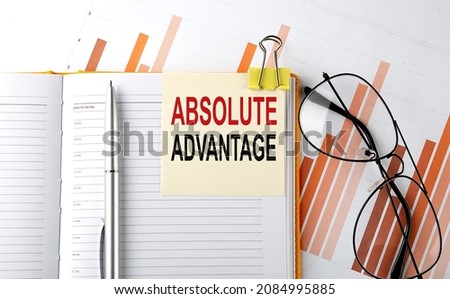 Text ABSOLUTE ADVANTAGE on sticker on notepad on diagram background