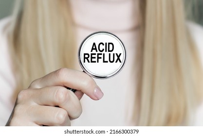 The Text Acid Reflux Sign On A Stethoscope In The Hands Of A Doctor, A Medical Concept
