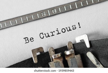 Text Be Curious typed on retro typewriter - Shutterstock ID 1939859443