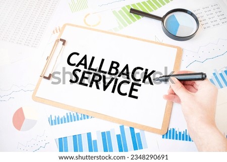 Text CALLBACK SERVICE on white paper sheet and marker on businessman hand on the diagram. Business concept