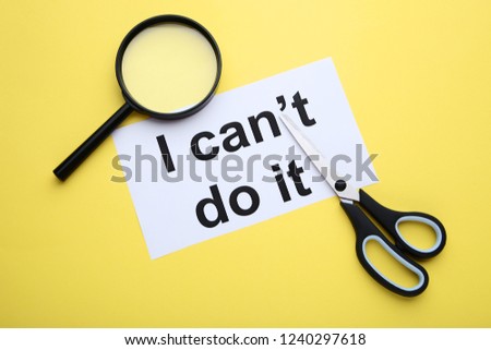 Text I can't do it with scissors and magnifying glass on yellow background