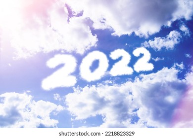 Text Caption 2022 In Clouds. Cloud-style Text In Sunny Glare..