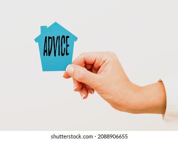 Text caption presenting Advice. Word for guidance or recommendations offered with regard prudent action A Young Lady Businesswoman Holding Presenting Home In Business Outfit