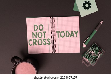 Text caption presenting Do Not Cross. Conceptual photo Crossing is forbidden dangerous caution warning not to do it - Shutterstock ID 2253957159