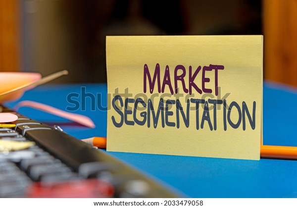 Text caption\
presenting Market Segmentation. Word for dividing a market of\
potential customers into groups Multiple Assorted Collection Office\
Stationery Photo Placed Over\
Table