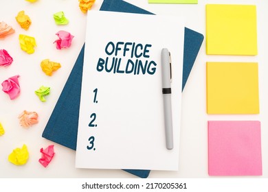 Text Caption Presenting Office Building. Internet Concept Commercial Buildings Are Used For Commercial Purposes Multiple Assorted Collection Office Stationery Photo Placed Over Table