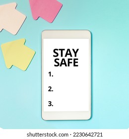 Text caption presenting Stay Safe. Business approach secure from threat of danger, harm or place to keep articles - Shutterstock ID 2230642721