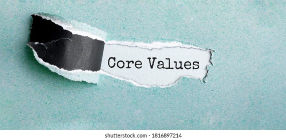 The text CORE VALUES appearing behind torn brown paper - Shutterstock ID 1816897214
