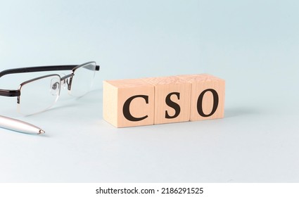 Text CSO Chief Strategy Officer written on the wooden cubes on a blue background