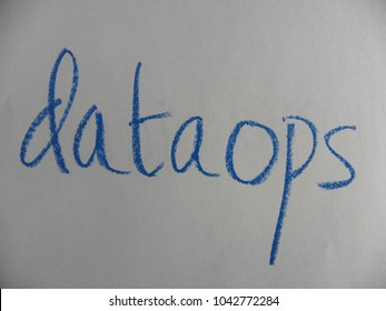 Text dataops hand written by blue oil pastel on white color paper