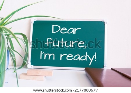 Text Dear Future, I Am Ready! written on the green chalkboard