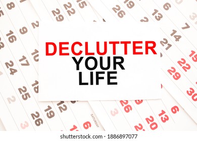 Text DECLUTTER YOUR LIFE On A Sheet From Notepad.a Digital Background. Business Concept . Business And Finance.