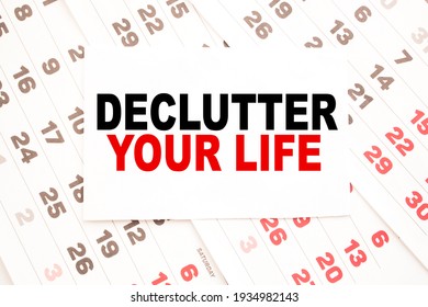 Text DECLUTTER YOUR LIFE On A Sheet From Notepad.a Digital Background. Business Concept . Business And Finance.