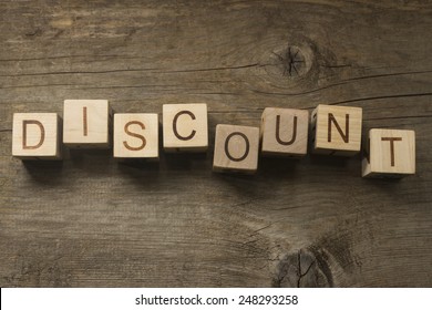 text discount on a wooden background