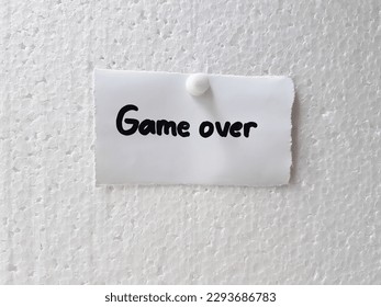 Text game over on a white background.