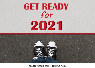 Text Get Ready For 2021 On Asphalt In Front Of Woman, Top View