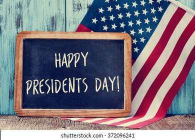 the text happy presidents day written in a chalkboard and a flag of the United States, on a rustic wooden background