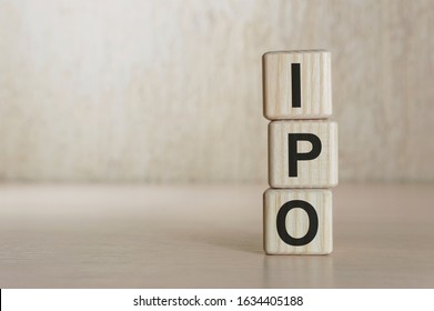 Text IPO on wood cube block, stock investment concept.