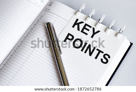 text KEY POINTS on short note texture background with pen