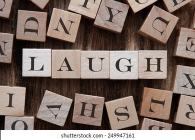 text of LAUGH on cubes - Powered by Shutterstock