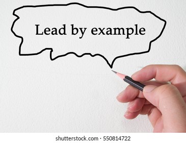 Text lead by example concept 