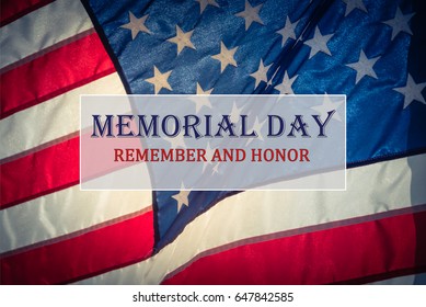 Text Memorial Day And Honor On Flowing American Flag Background. Concept Of Memorial Day Or Veteran's Day In America.