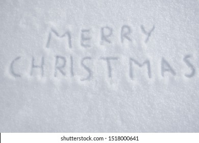 text merry christmas on snow