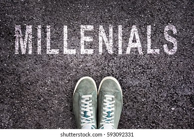 Text Millenials Written On Asphalt With Shoes