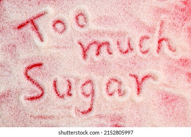 Text Too Much Sugar Written On Granulated Sugar.