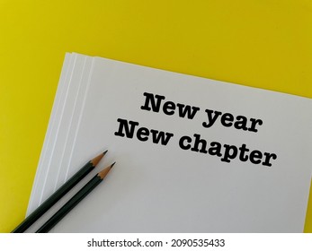 Text New Year, New Chapter On White Paper With Pencils. New Year Concept
