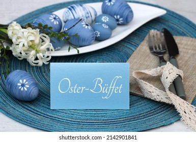 The Text Osterbüffet On A Card With Easter Decorations.
Osterbüffet Means Translated Easter Buffet.