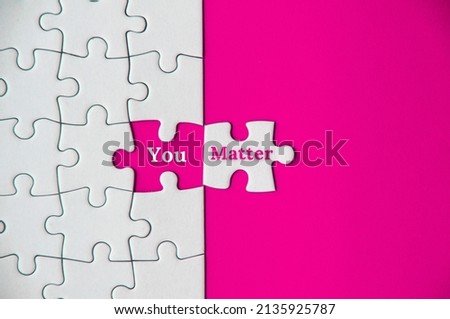 Text on missing jigsaw puzzle - you matter. Motivational concept