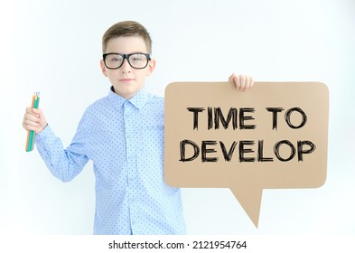text on paper time to develop in hand boy. Personal growth concept.