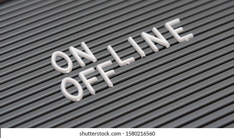  Text "On/off line" with letters on typesetting board