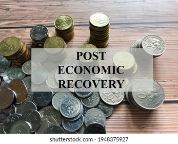 Text Post Economic Recovery With Coins In The Background. Economy Concept After Covid 19 Pandemic