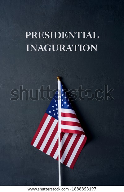 the text presidential inauguration and an
american flag on a dark gray
background