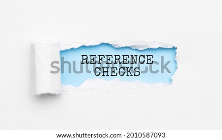 The text REFERENCE CHECKS appearing behind torn yellow paper