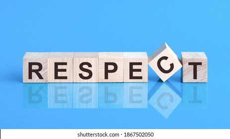 Text Respect on wood cube block, stock concept. The text respect is written on the cubes in black letters, the cubes are located on a blue glass surface.  - Shutterstock ID 1867502050