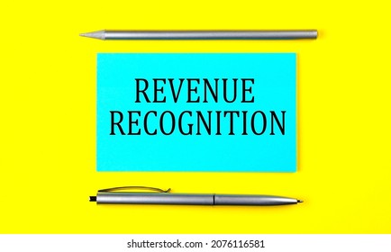 Text REVENUE RECOGNITION On Blue Sticker On The Yellow Background