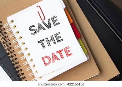 Text Save The Date On White Paper On The Laptop Computer / Business Concept