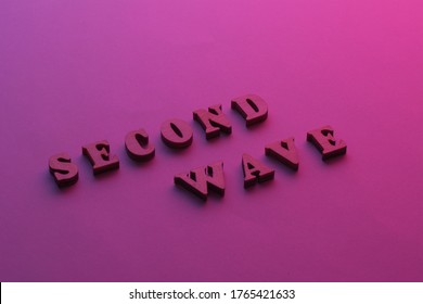 Text Second Wave COVID19 On Purple Background. 2nd Wave Of Coronavirus Is Coming. Concept Of The Second Wave Covid-19.