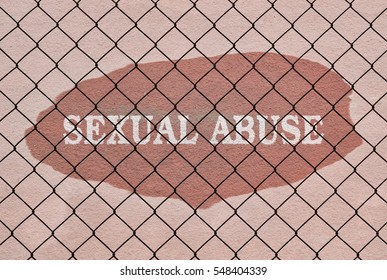 Text Sexual Abuse Written Under A Wire Fence